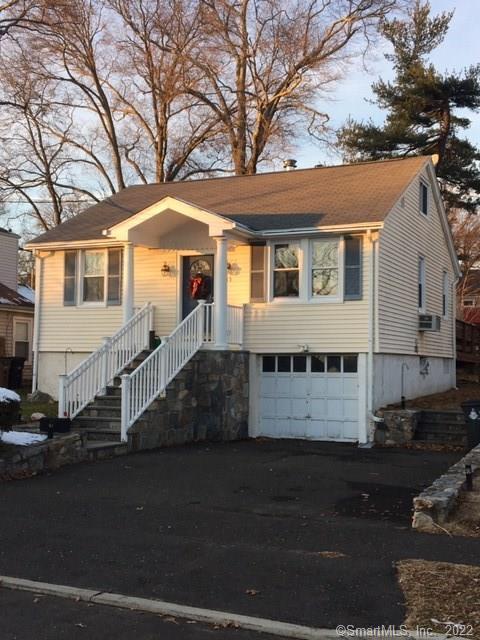 33 Hirsch Road Stamford, CT 06905 - Photo 1 of 1 a front view of a house with a yard