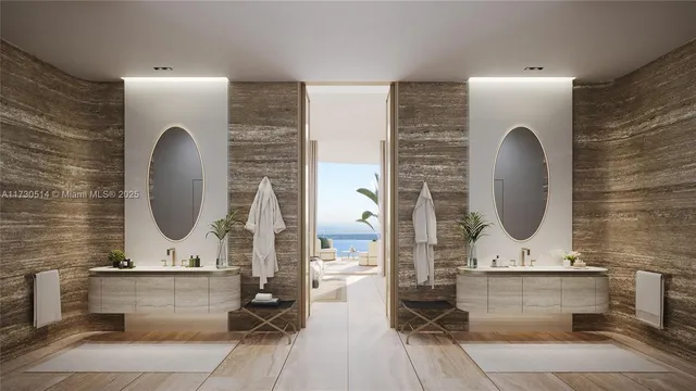 a bathroom with a double vanity sink mirror and bathtub