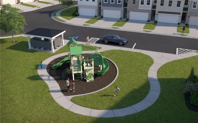 a view of a swimming pool with sitting area