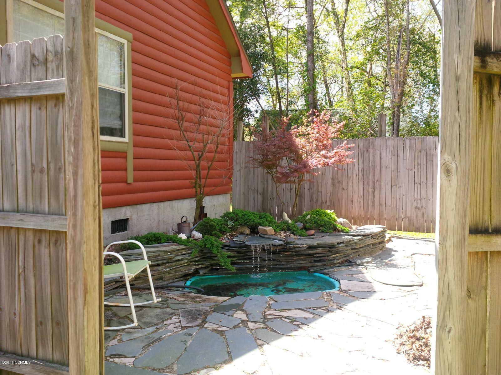 100 West Pointe Road Rocky Point, NC 28457 - Photo 23 of 26 w pointe yard pond