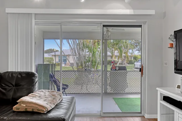 a kitchen with stainless steel appliances granite countertop a refrigerator and a microwave