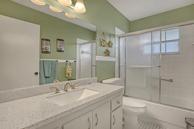 a bedroom with a bed and a television in it