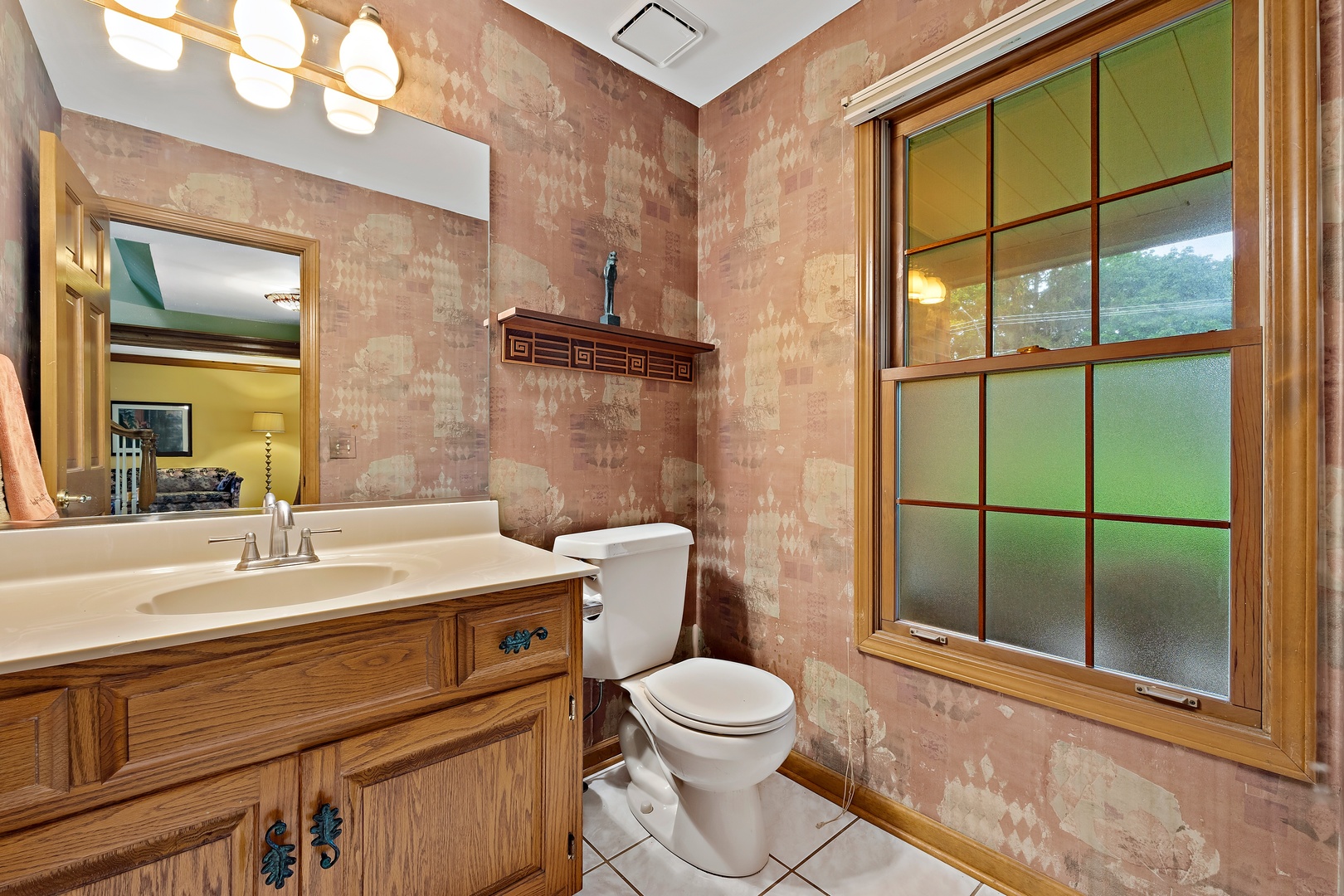 27W223 Jewell Road Winfield, IL 60190 - Photo 13 of 23 a bathroom with a sink a toilet and shower