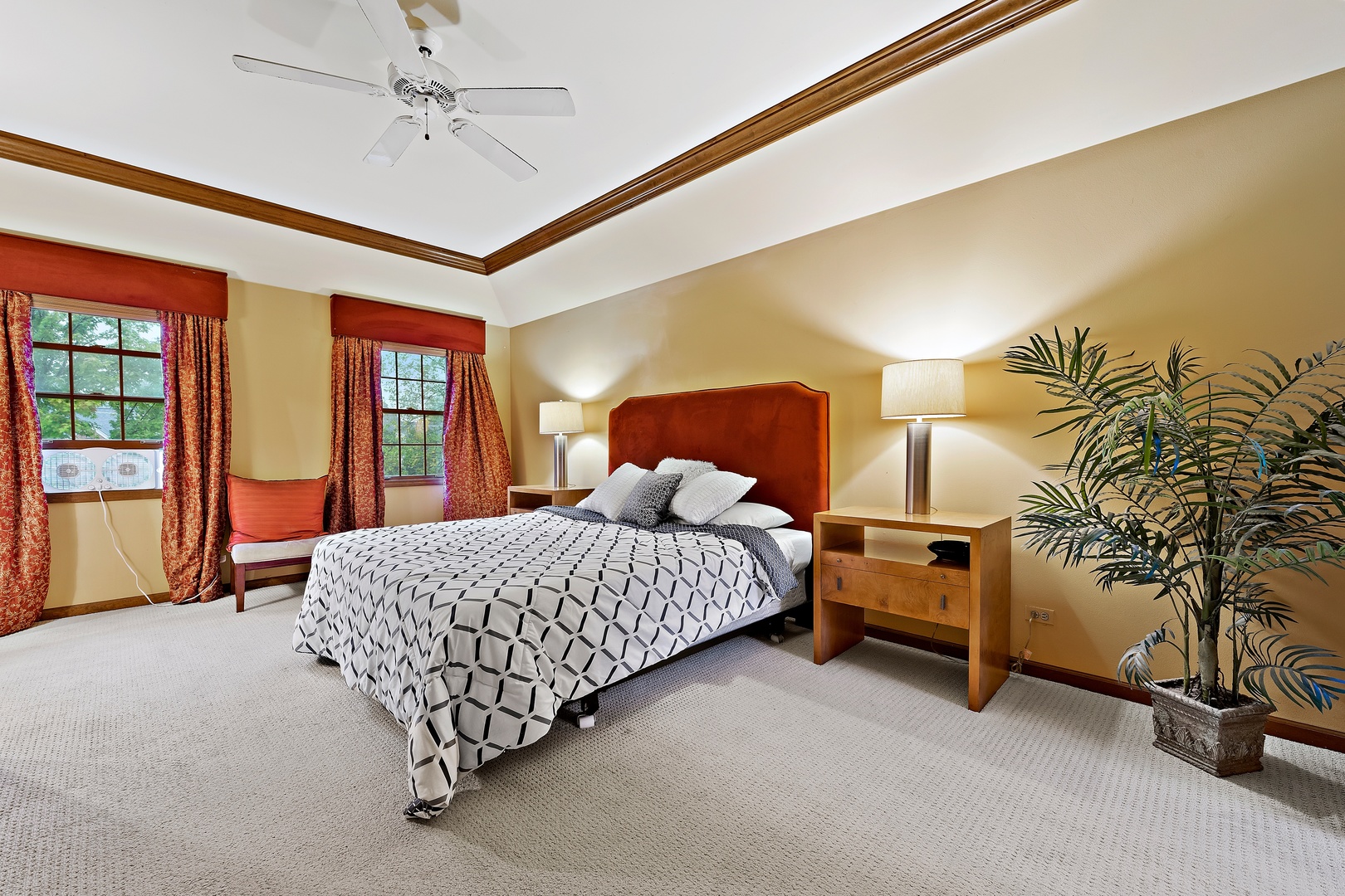 27W223 Jewell Road Winfield, IL 60190 - Photo 14 of 23 a bed room with a bed and a ceiling fan