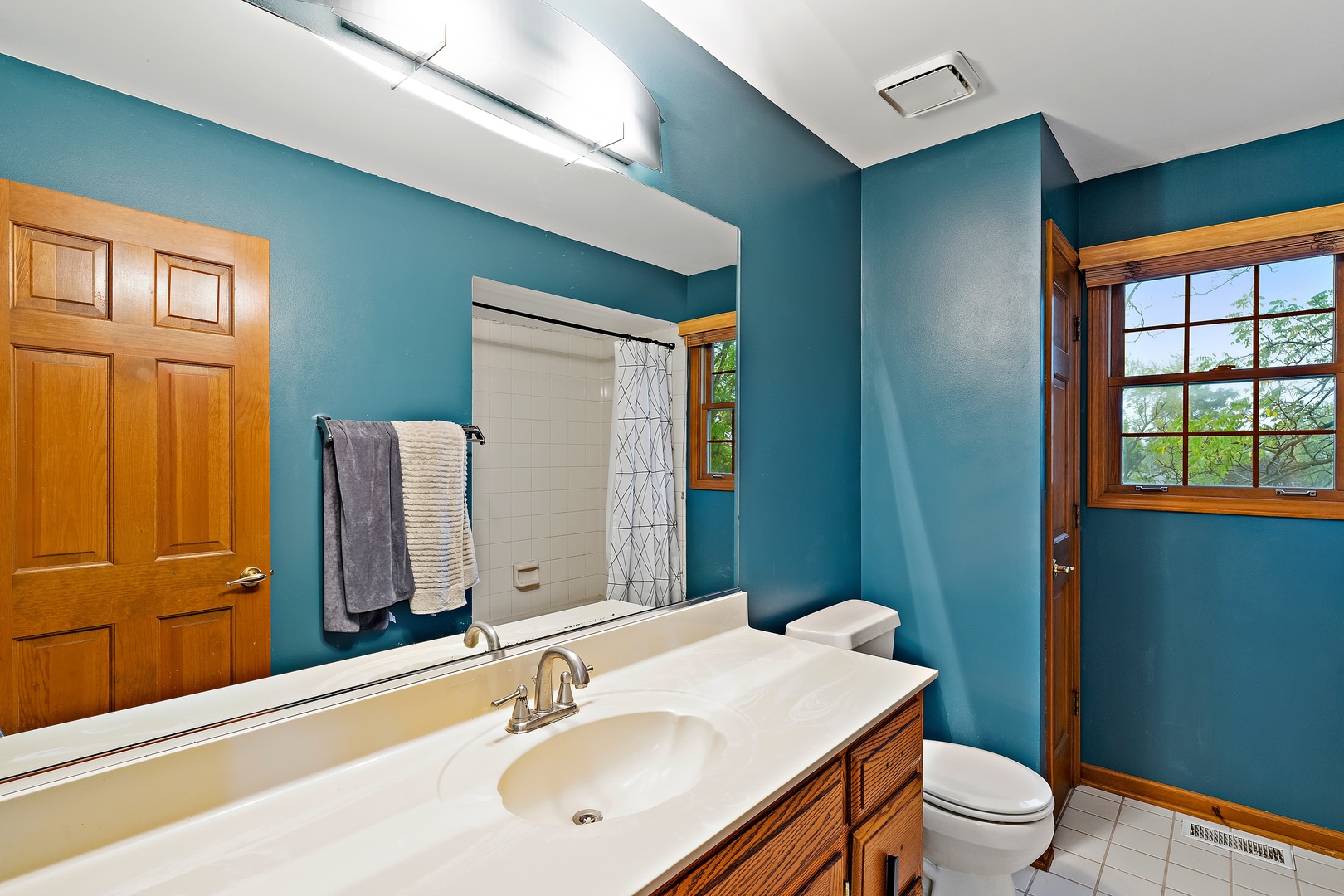 27W223 Jewell Road Winfield, IL 60190 - Photo 18 of 23 a bathroom with a sink toilet and a mirror