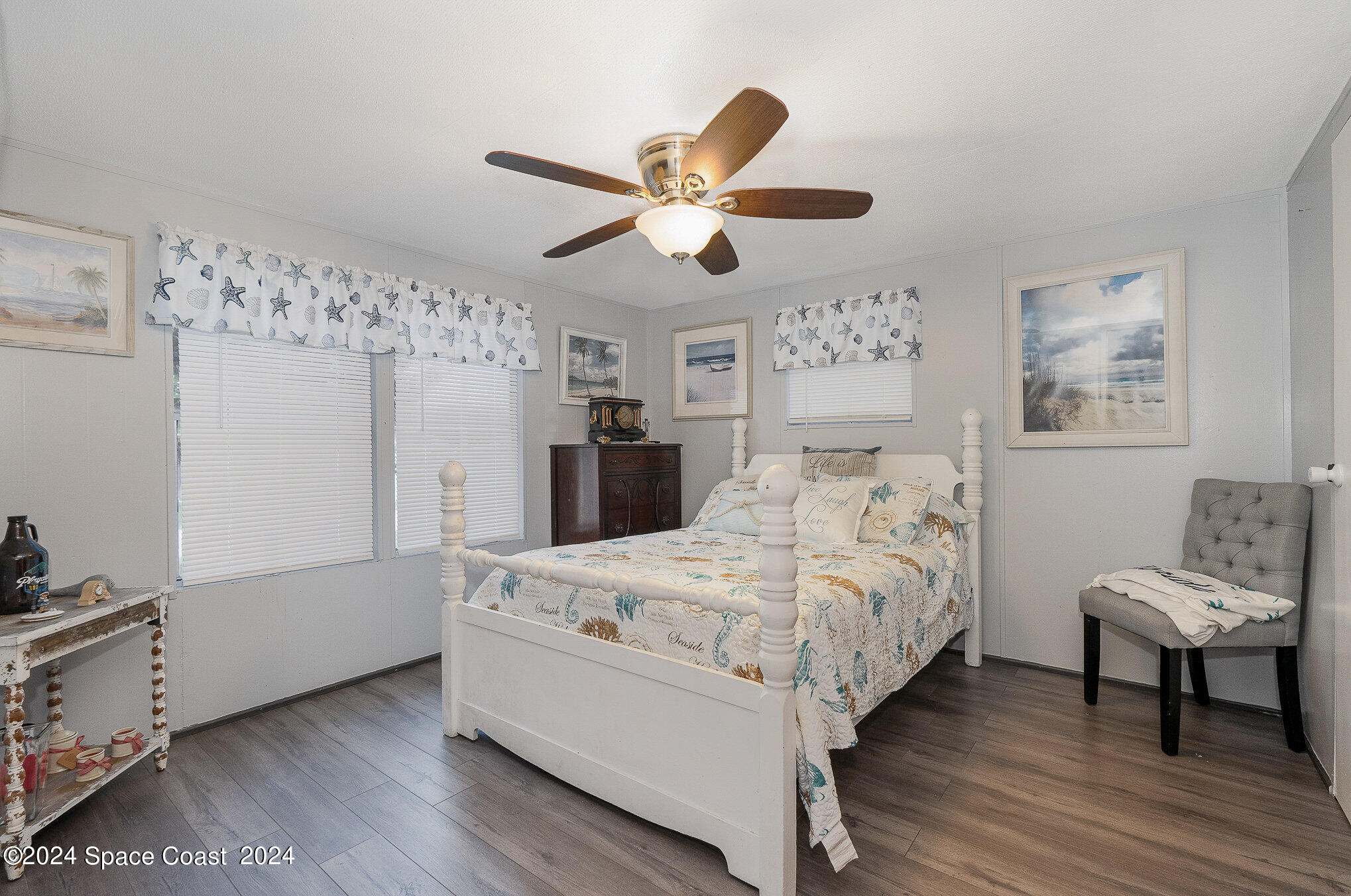 385 Ronald Street Cocoa, FL 32927 - Photo 13 of 24 a bedroom with a bed and a window