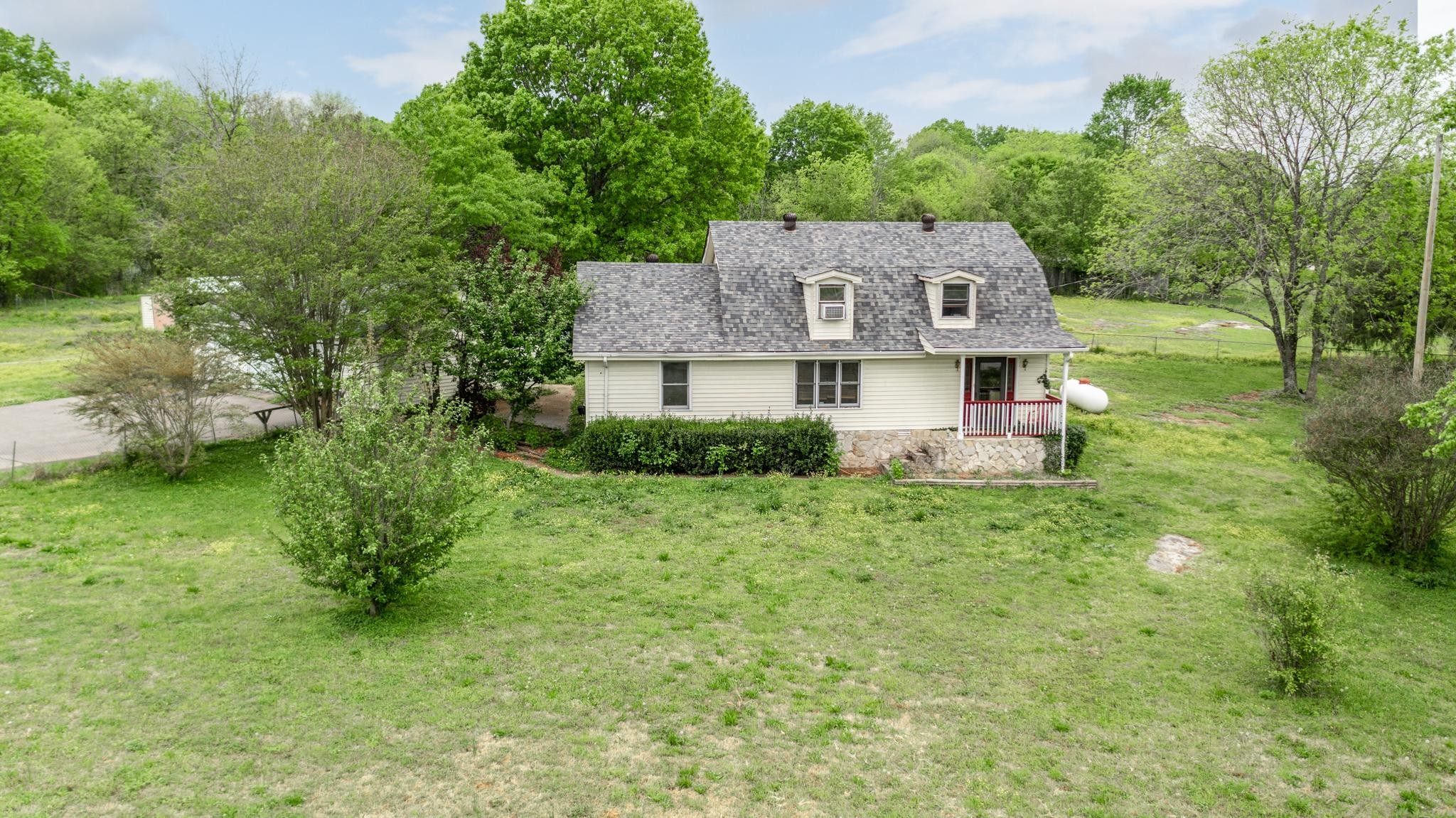 3356 Cairo Bend Road Lebanon, TN 37087 - Photo 19 of 21 a aerial view of a house with a yard table and chairs