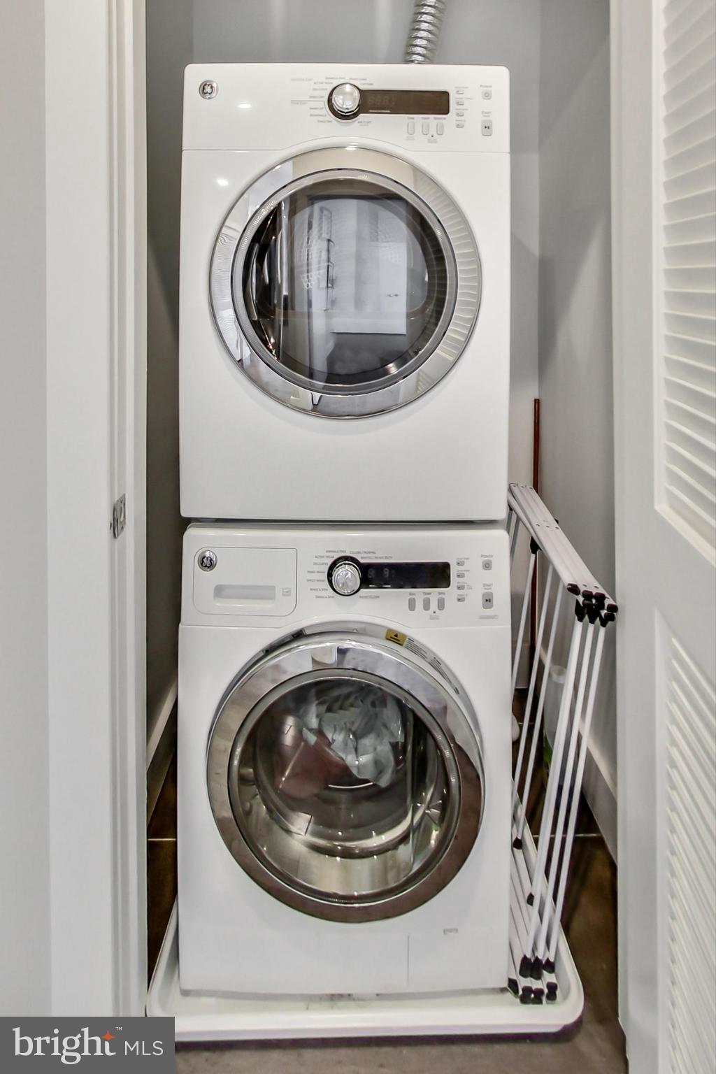 1767 Lanier Place Northwest, Unit 2 Washington, DC 20009 - Photo 12 of 19 a utility room with dryer and washer