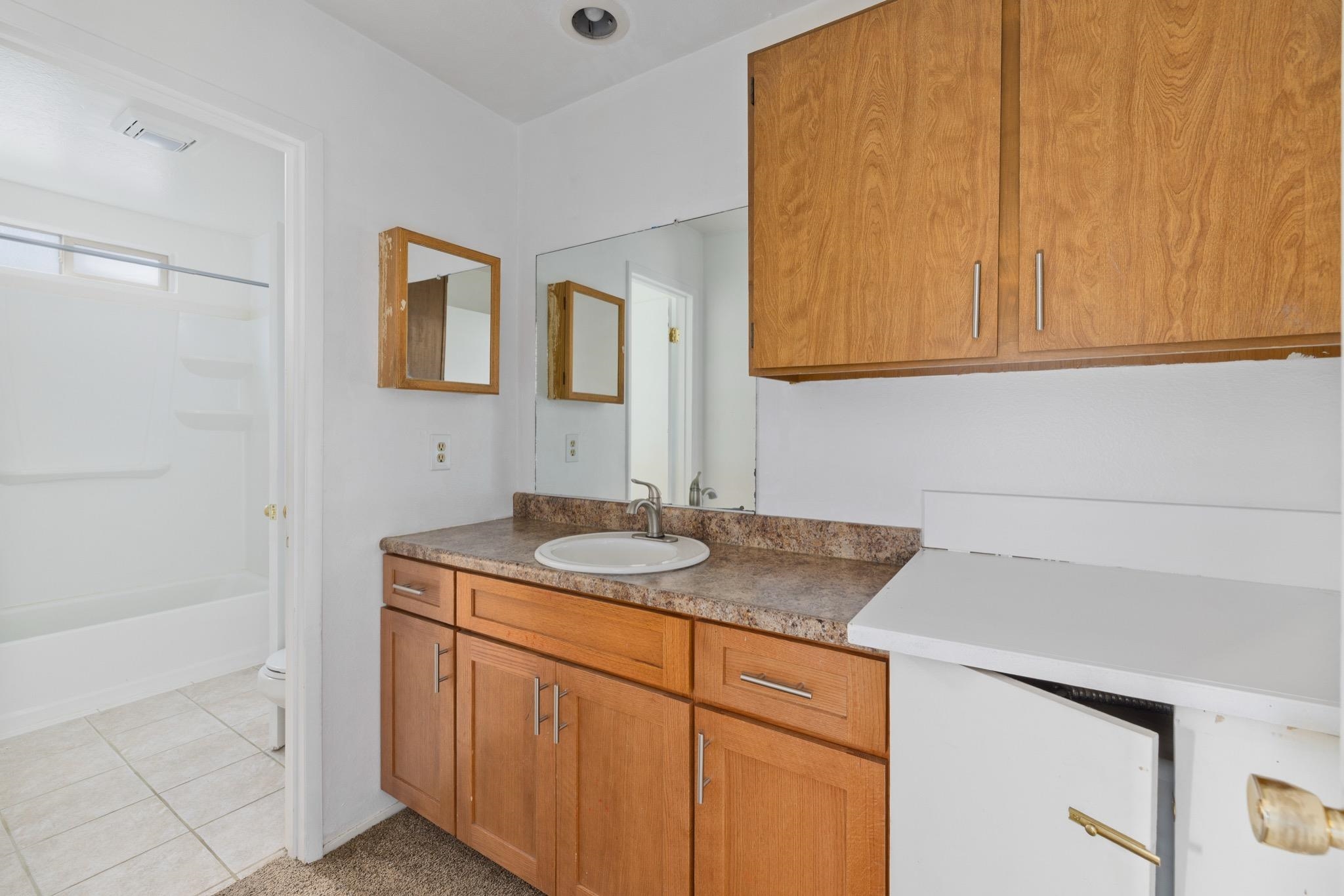 541 Mono Street, Unit 2 Mammoth Lakes, CA 93546 - Photo 12 of 16 a bathroom with a sink and a mirror