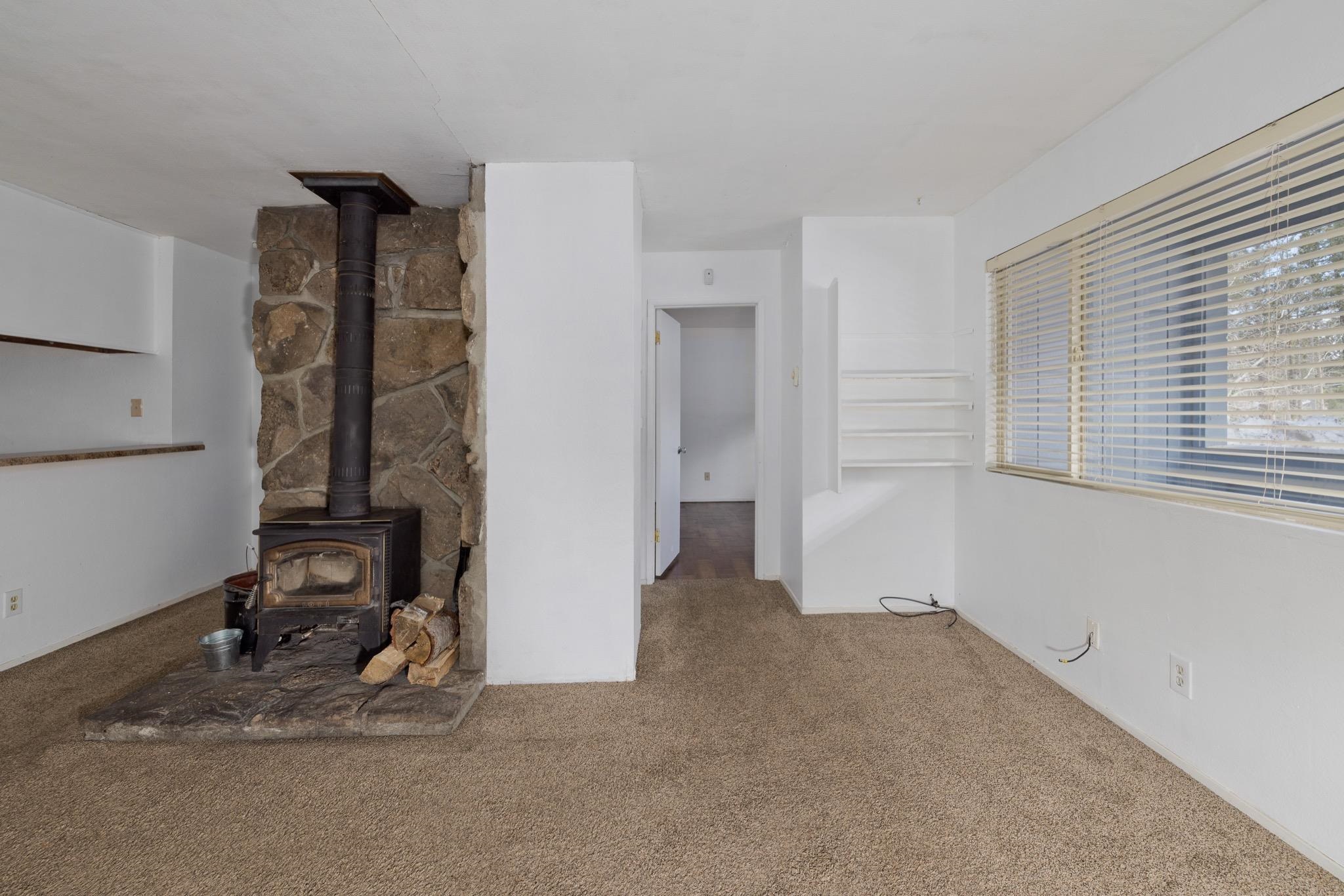 541 Mono Street, Unit 2 Mammoth Lakes, CA 93546 - Photo 5 of 16 an empty room with windows