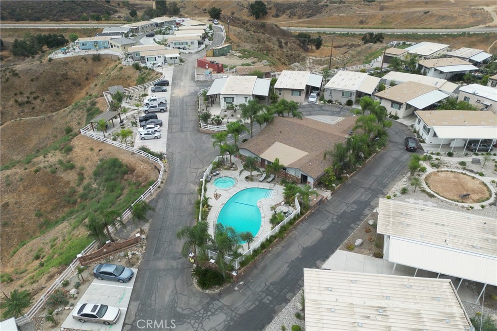 1134 Villa Calimesa Lane, Unit 106 Calimesa, CA 92320 - Photo 22 of 22 an aerial view of residential houses with outdoor space