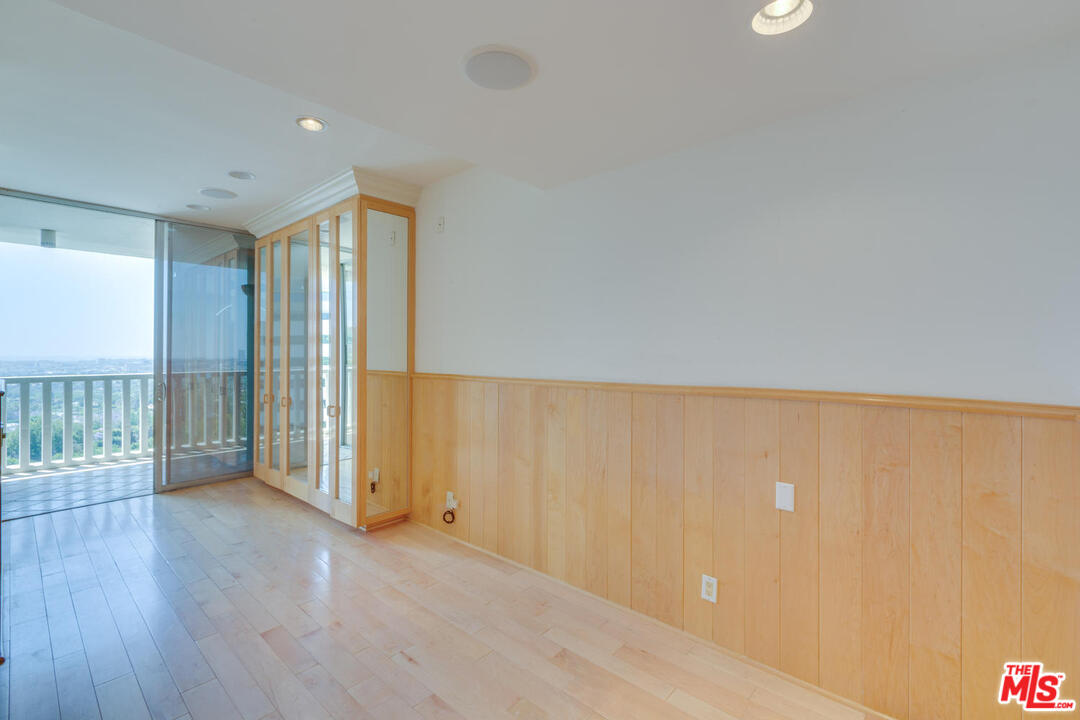 9255 Doheny Road, Unit 902 West Hollywood, CA 90069 - Photo 22 of 47 a view of entryway with wooden floor