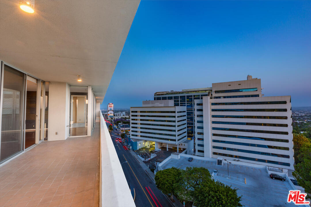 9255 Doheny Road, Unit 902 West Hollywood, CA 90069 - Photo 45 of 47 a view of a balcony with an outdoor space