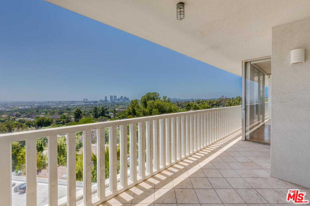 9255 Doheny Road, Unit 902 West Hollywood, CA 90069 - Photo 47 of 47 a view of a balcony with an outdoor space