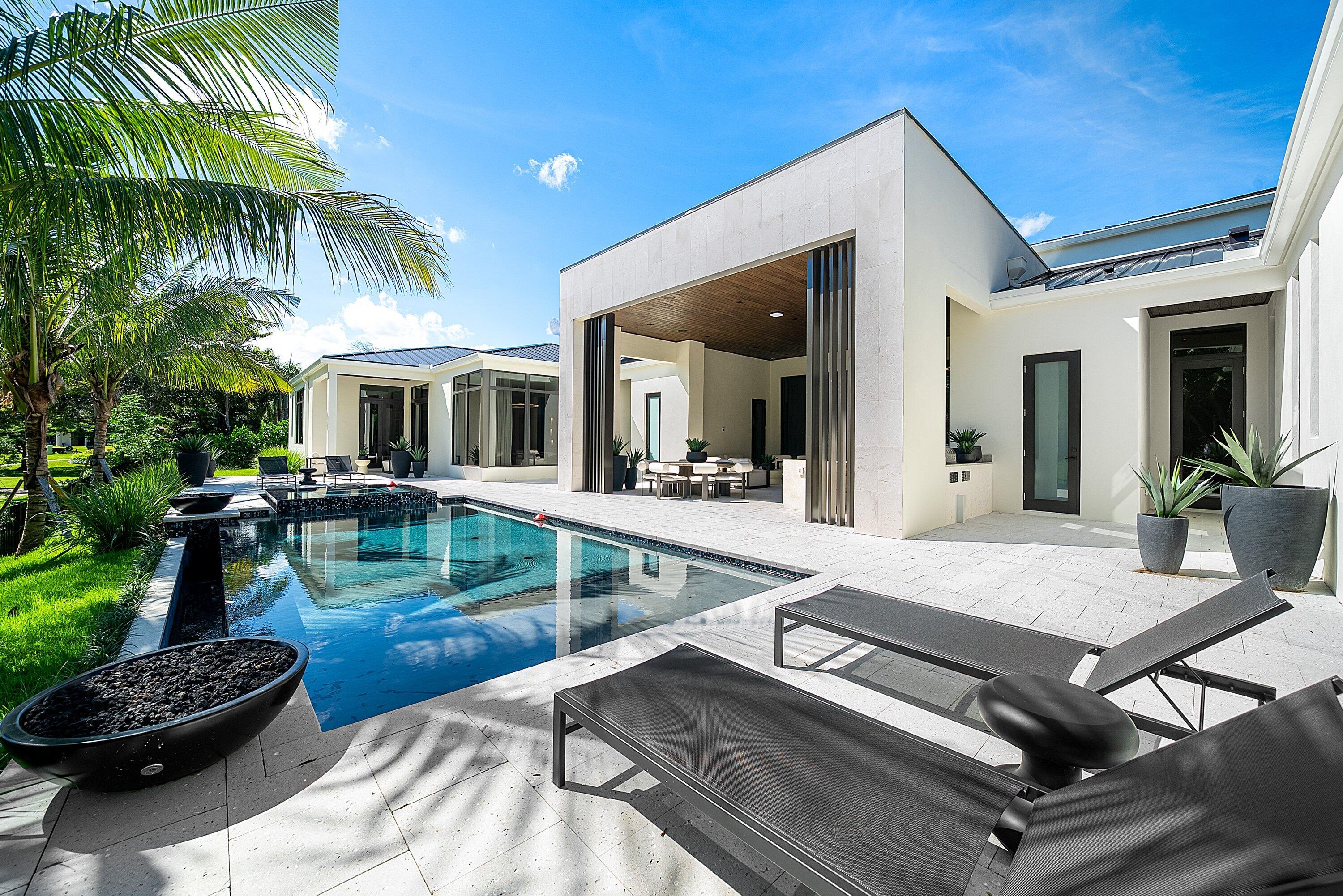 2480 Windsor Circle Boca Raton, FL 33431 - Photo 40 of 53 Pool w/ Fire Bowls
