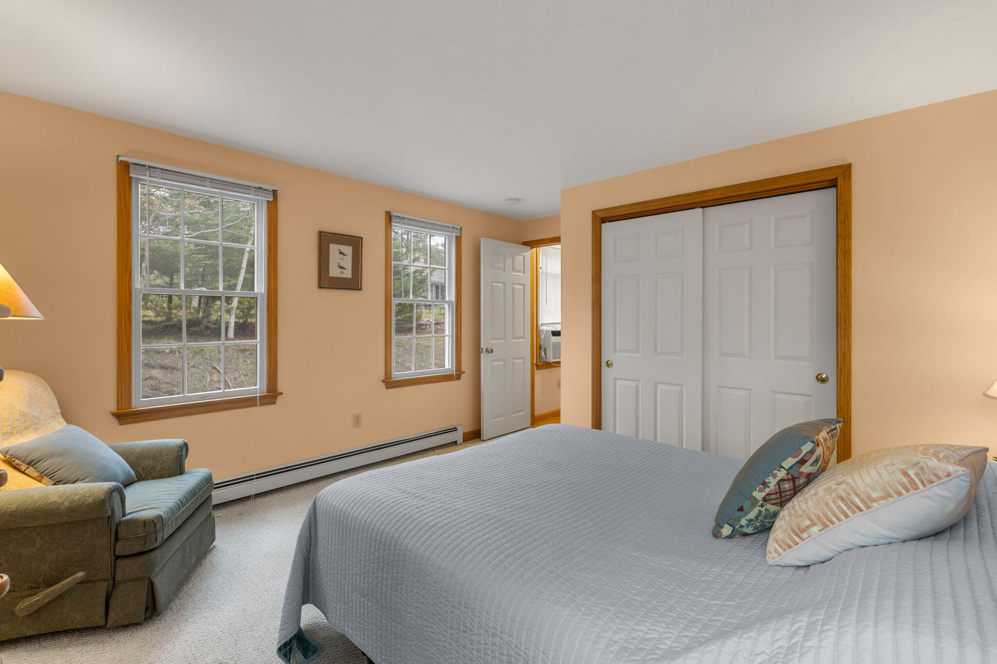 285 Blue Heron Road Wellfleet, MA 02667 - Photo 14 of 31 a bedroom with a bed couch and window