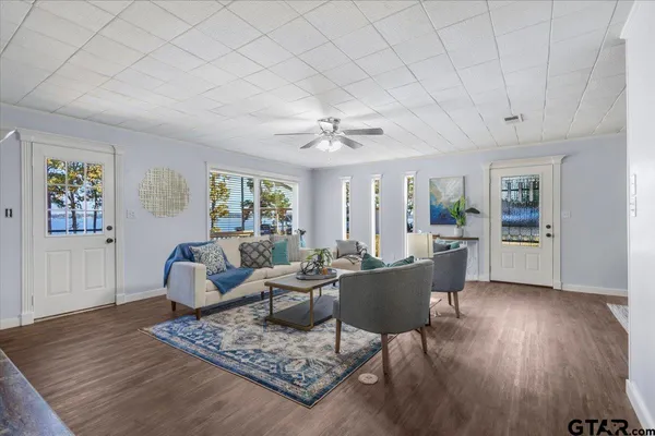 a living room with furniture and a table