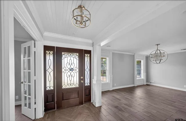 a view of an entryway with a window