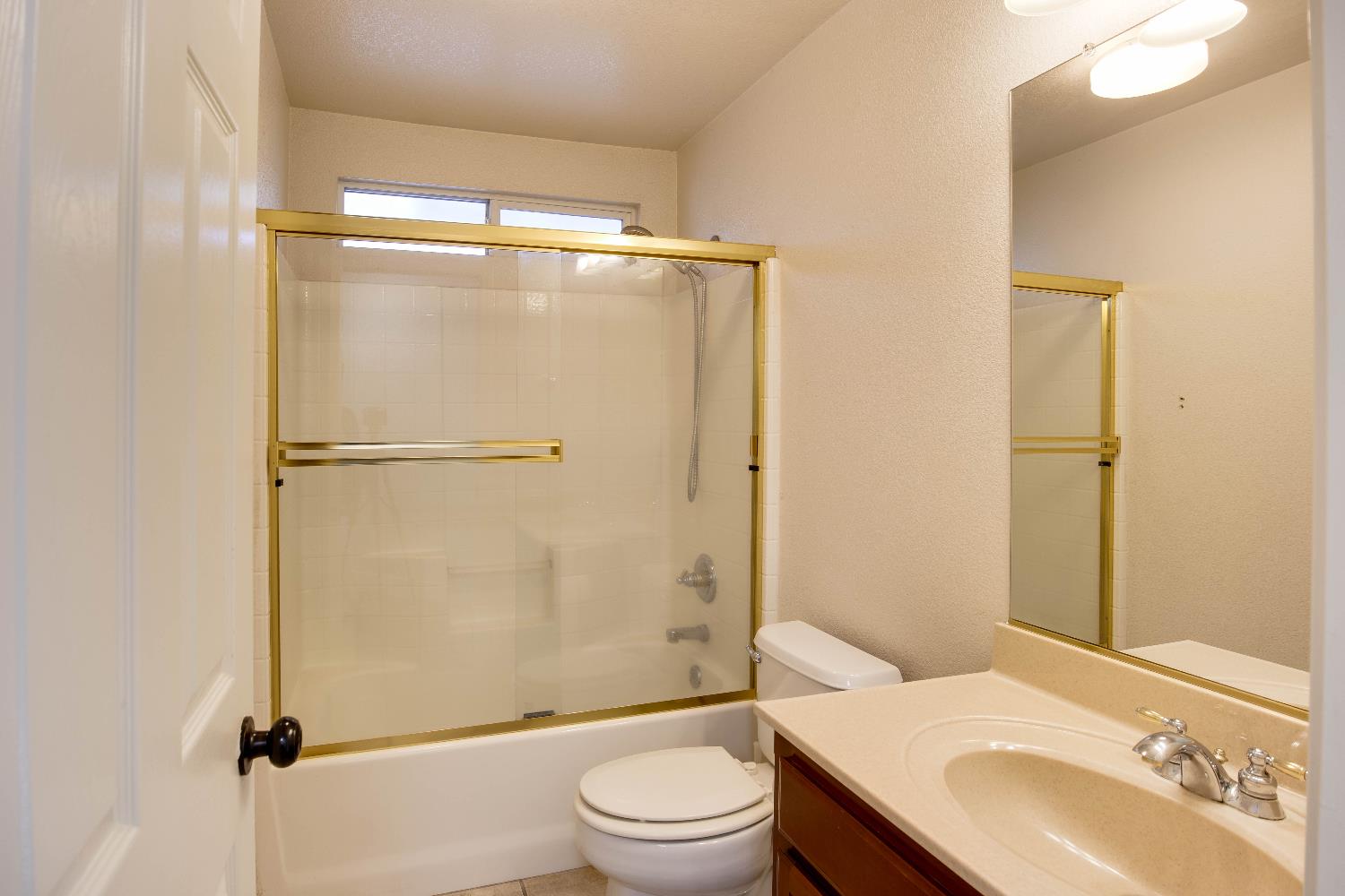 637 Rebekah Court Ripon, CA 95366 - Photo 43 of 69 a bathroom with a sink toilet and shower