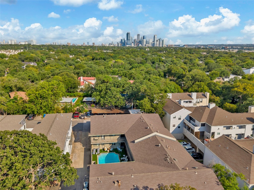 1307 Norwalk Lane, Unit 104 Austin, TX 78703 - Photo 22 of 22 an aerial view of a house with a lake view