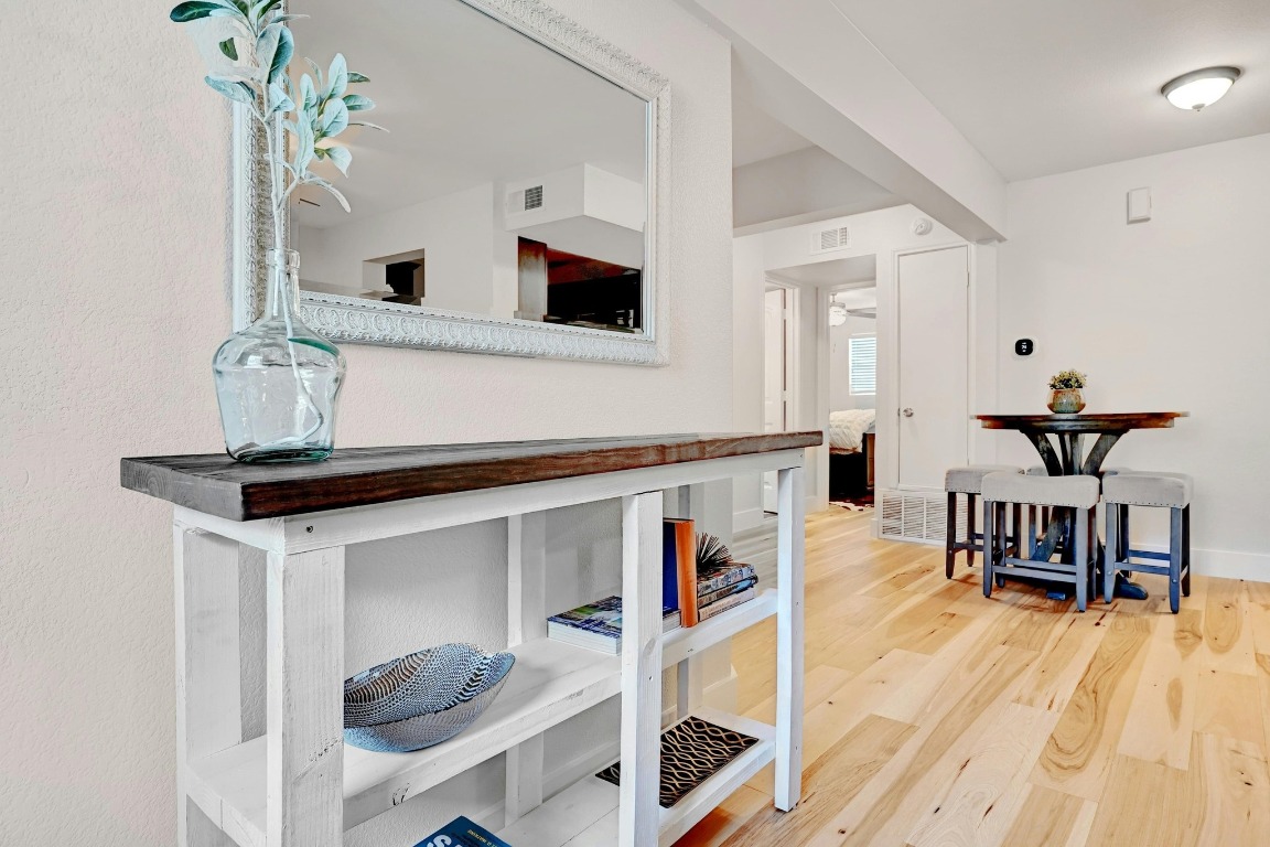 1307 Norwalk Lane, Unit 104 Austin, TX 78703 - Photo 7 of 22 a living room with furniture and decor