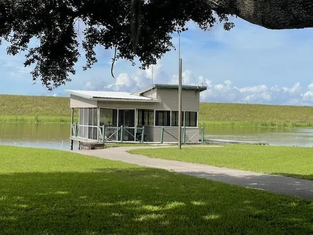 a view of a balcony with wooden floor