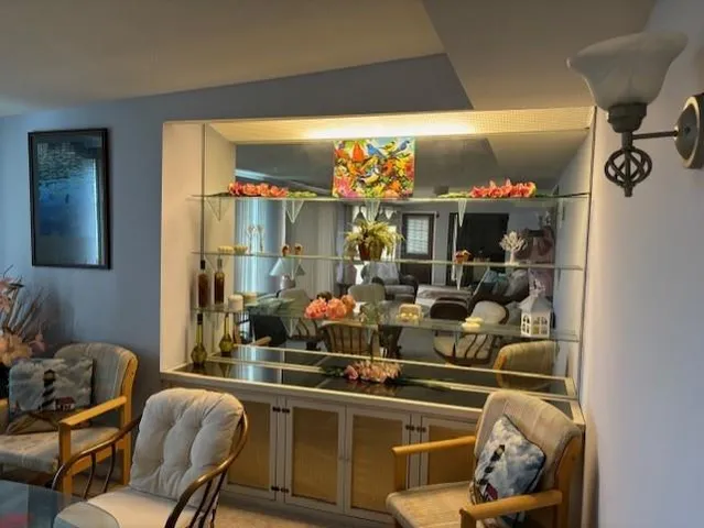 a room with furniture and a large window