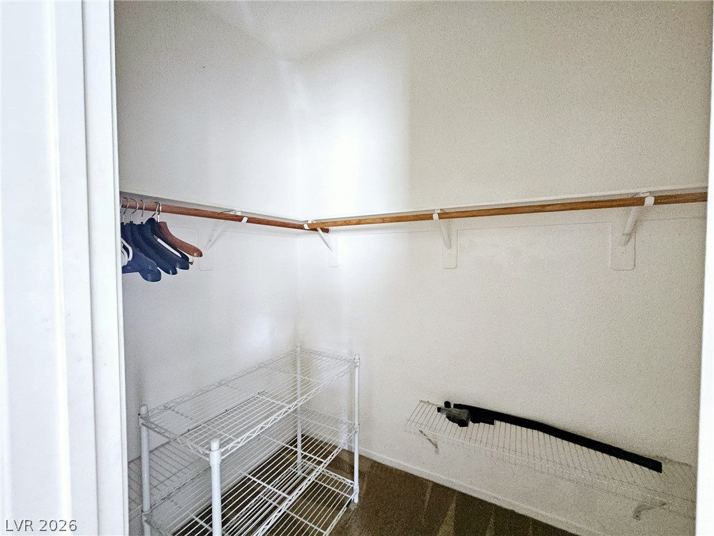 1663 Lefty Garcia Way Henderson, NV 89002 - Photo 7 of 31 Ample storage solutions for an organized wardrobe.