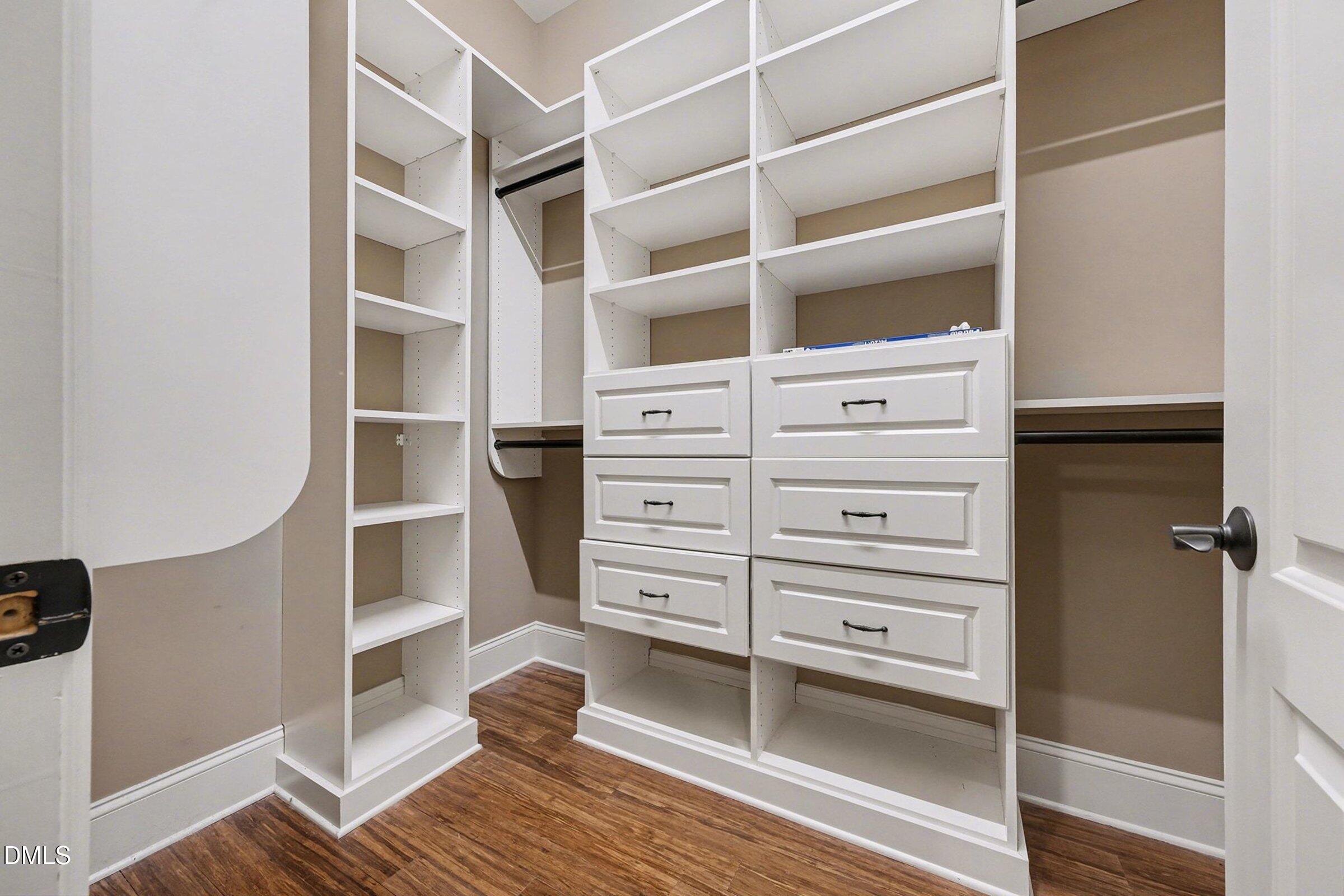 4105 Gardenlake Drive Raleigh, NC 27612 - Photo 15 of 28 a view of walk in closet with empty racks