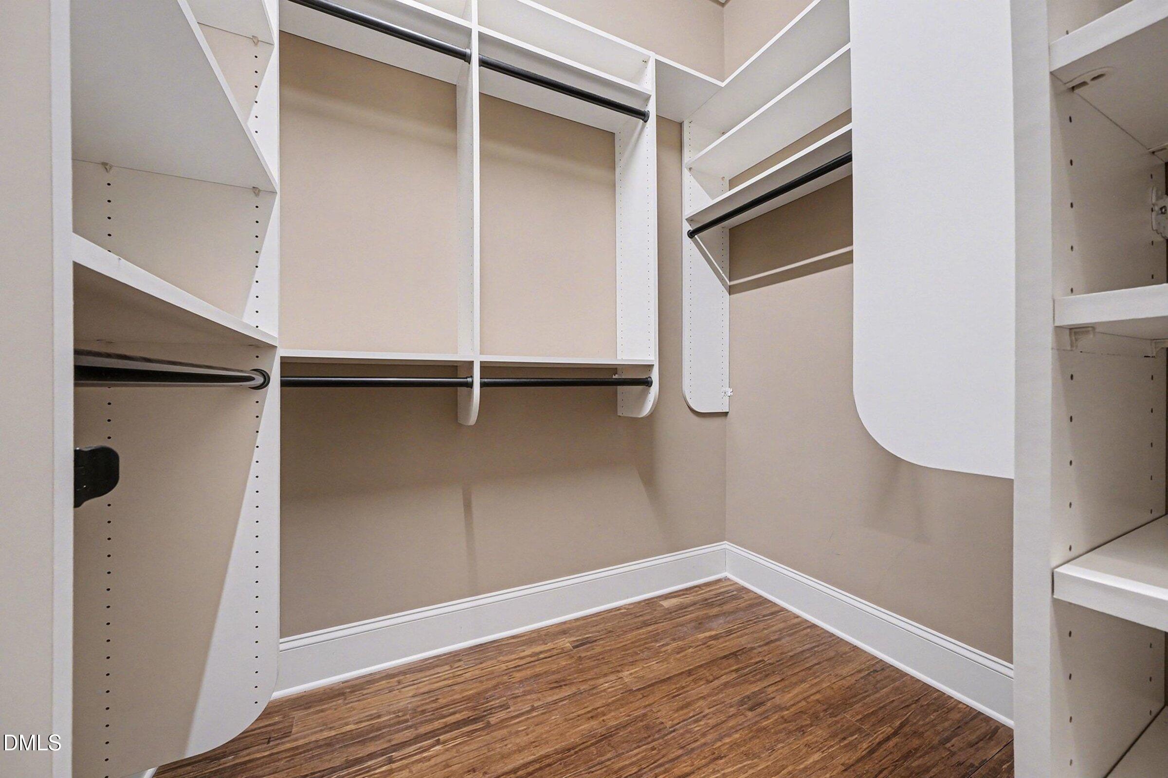 4105 Gardenlake Drive Raleigh, NC 27612 - Photo 16 of 28 a view of walk in closet with empty racks