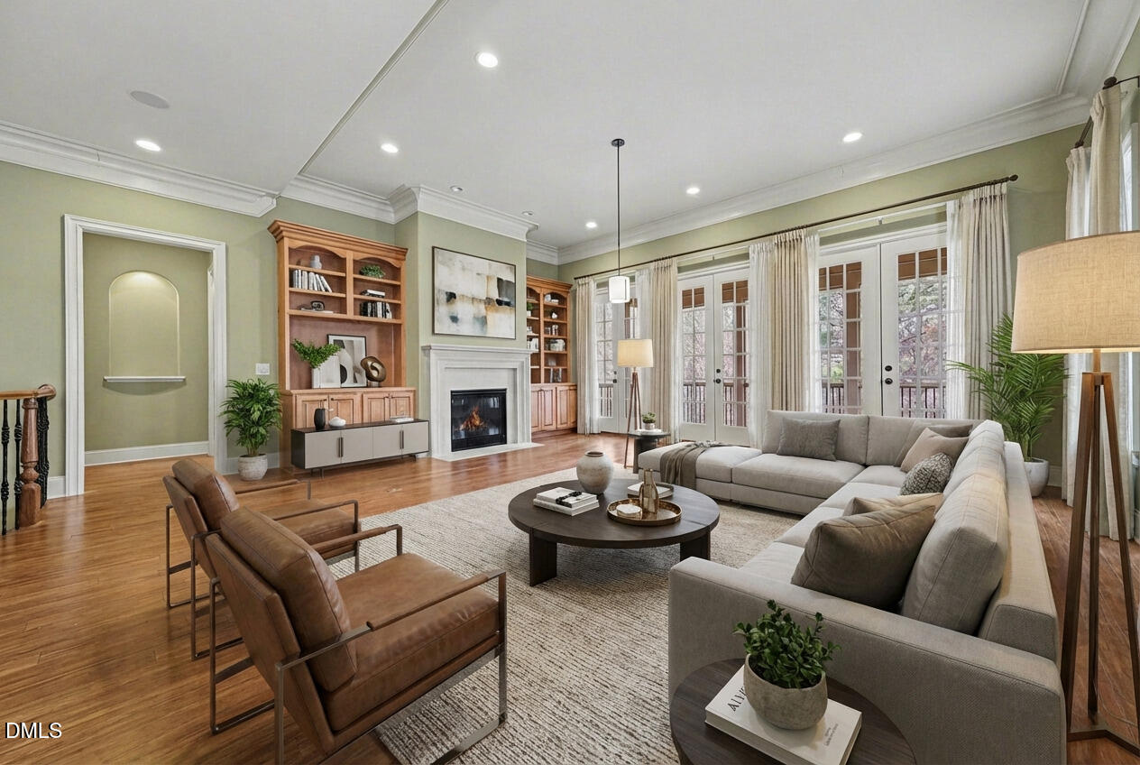 4105 Gardenlake Drive Raleigh, NC 27612 - Photo 23 of 28 a living room with furniture fireplace and a large window