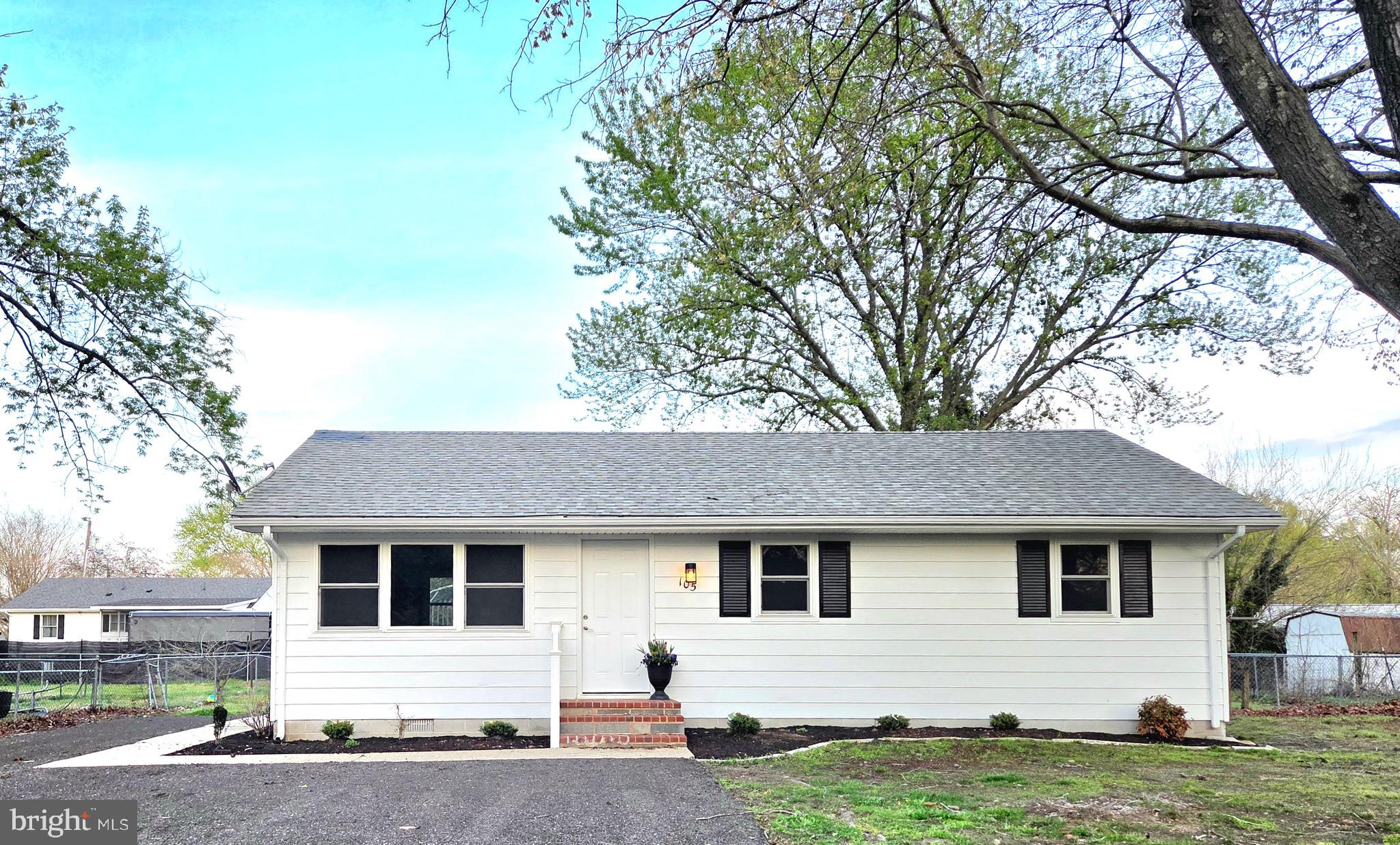 105 Goodwill Avenue Secretary, MD 21664 - Photo 1 of 22 a front view of a house with a yard