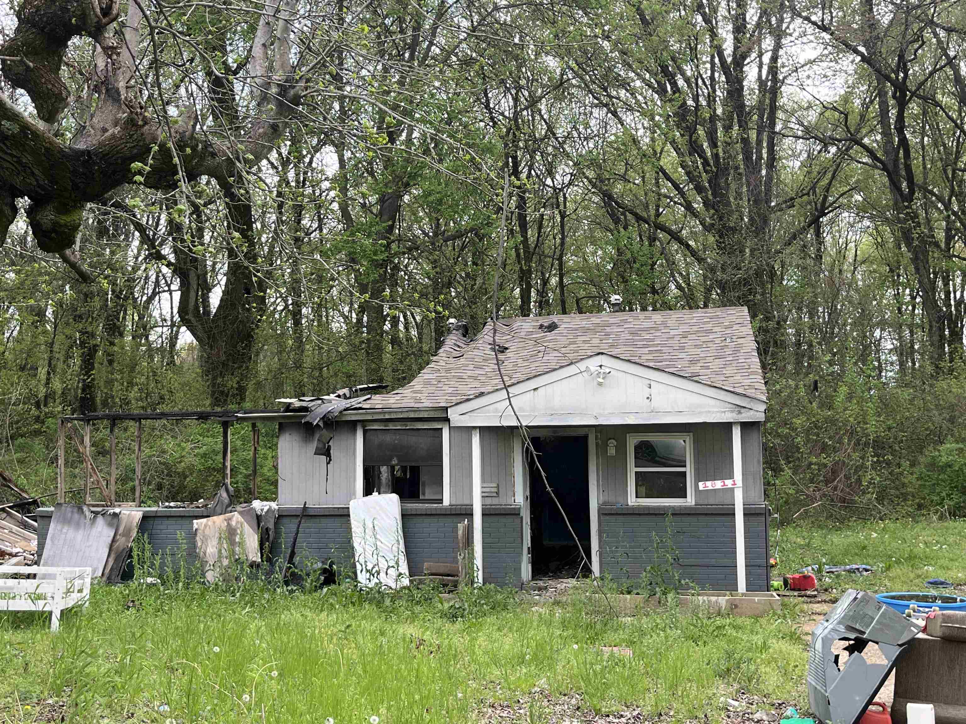 1811 Rozelle Street Memphis, TN 38106 - Photo 1 of 3 Bungalow-style home featuring an outbuilding and roof with shingles