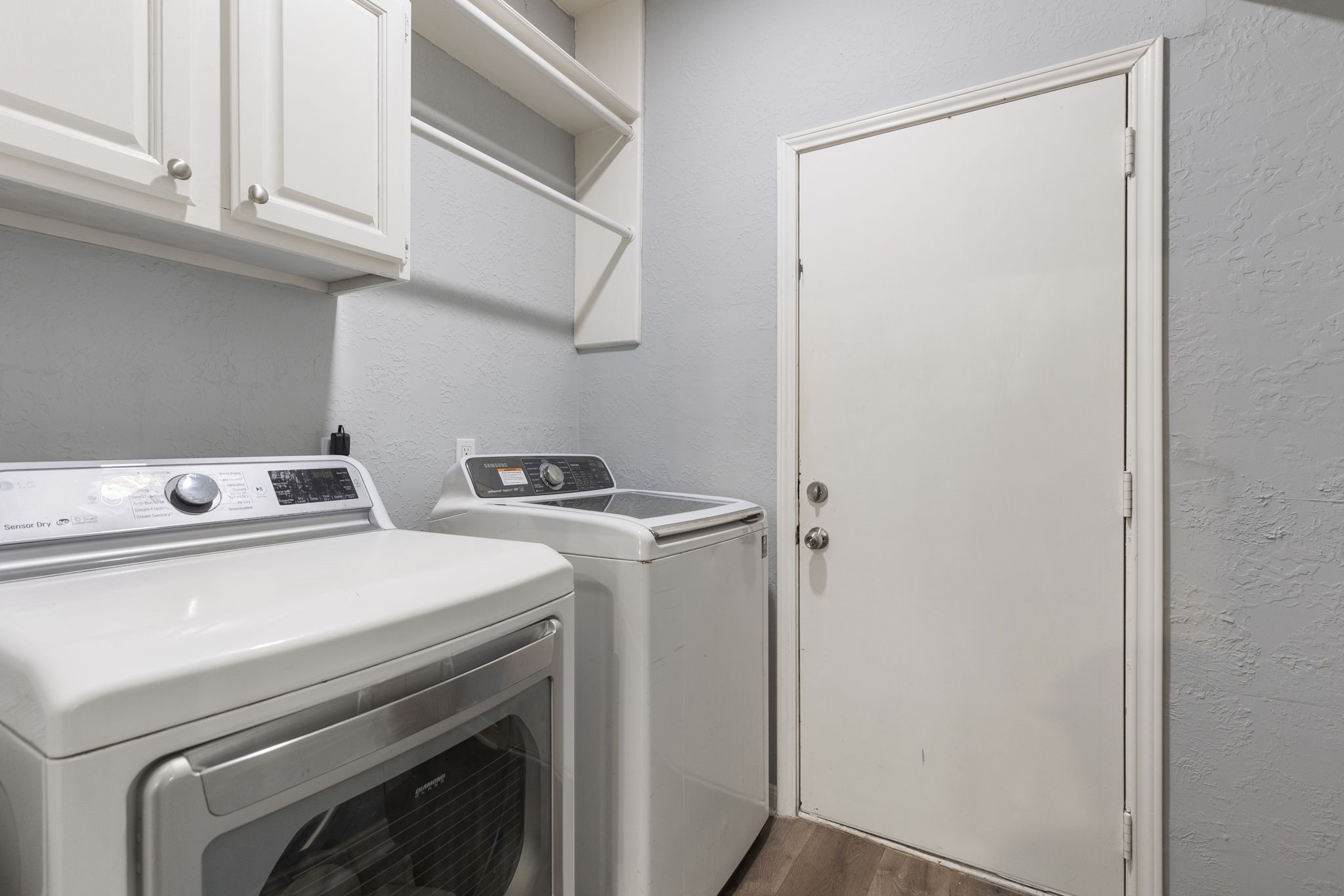2110 Paso Rello Drive Houston, TX 77077 - Photo 20 of 41 a utility room with dryer and washer