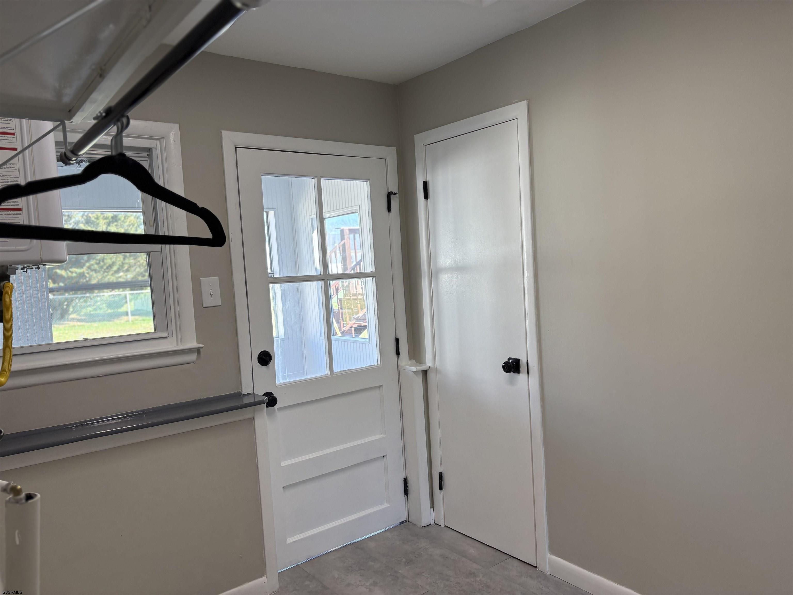 31 Gulph Mill Road Somers Point, NJ 08244 - Photo 18 of 32 a view of an entryway with a window