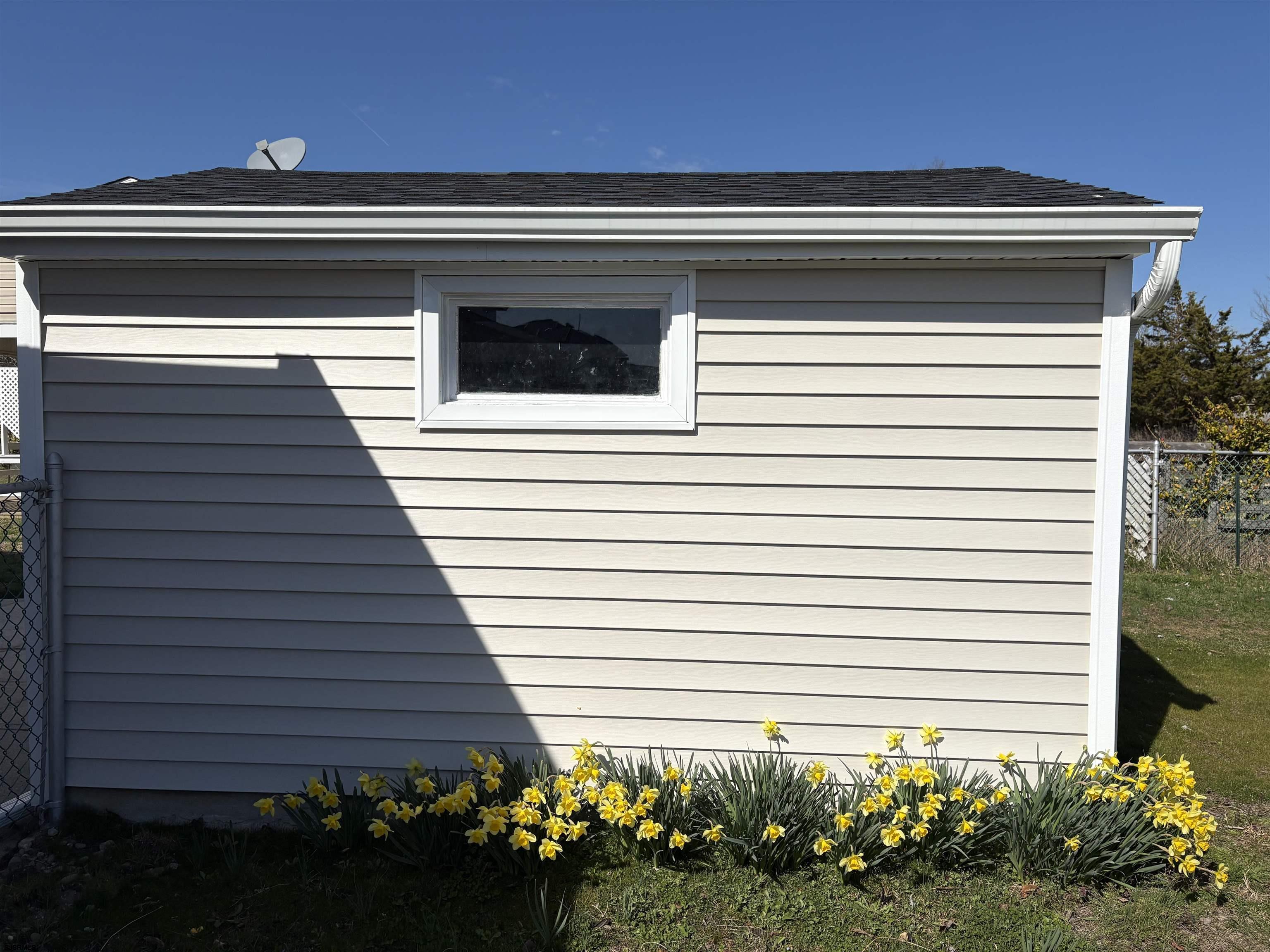 31 Gulph Mill Road Somers Point, NJ 08244 - Photo 29 of 32 a view of a house with a flower garden