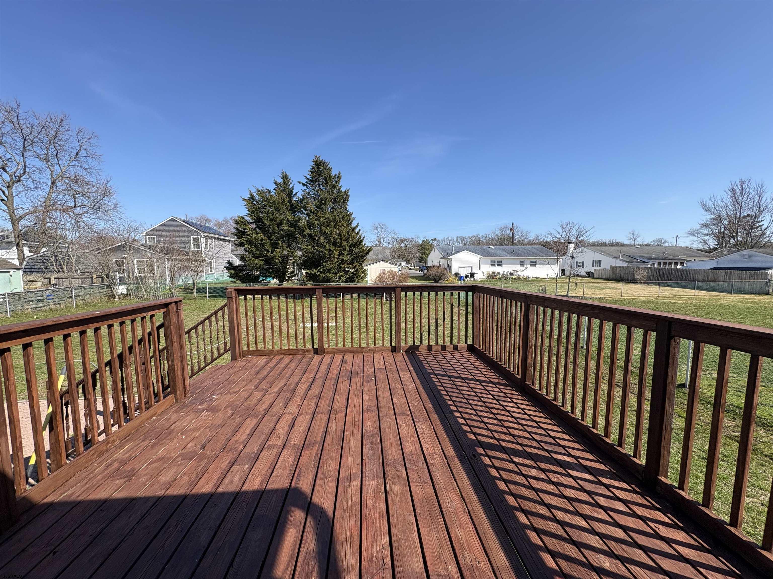 31 Gulph Mill Road Somers Point, NJ 08244 - Photo 30 of 32 a view of balcony with wooden floor and city view