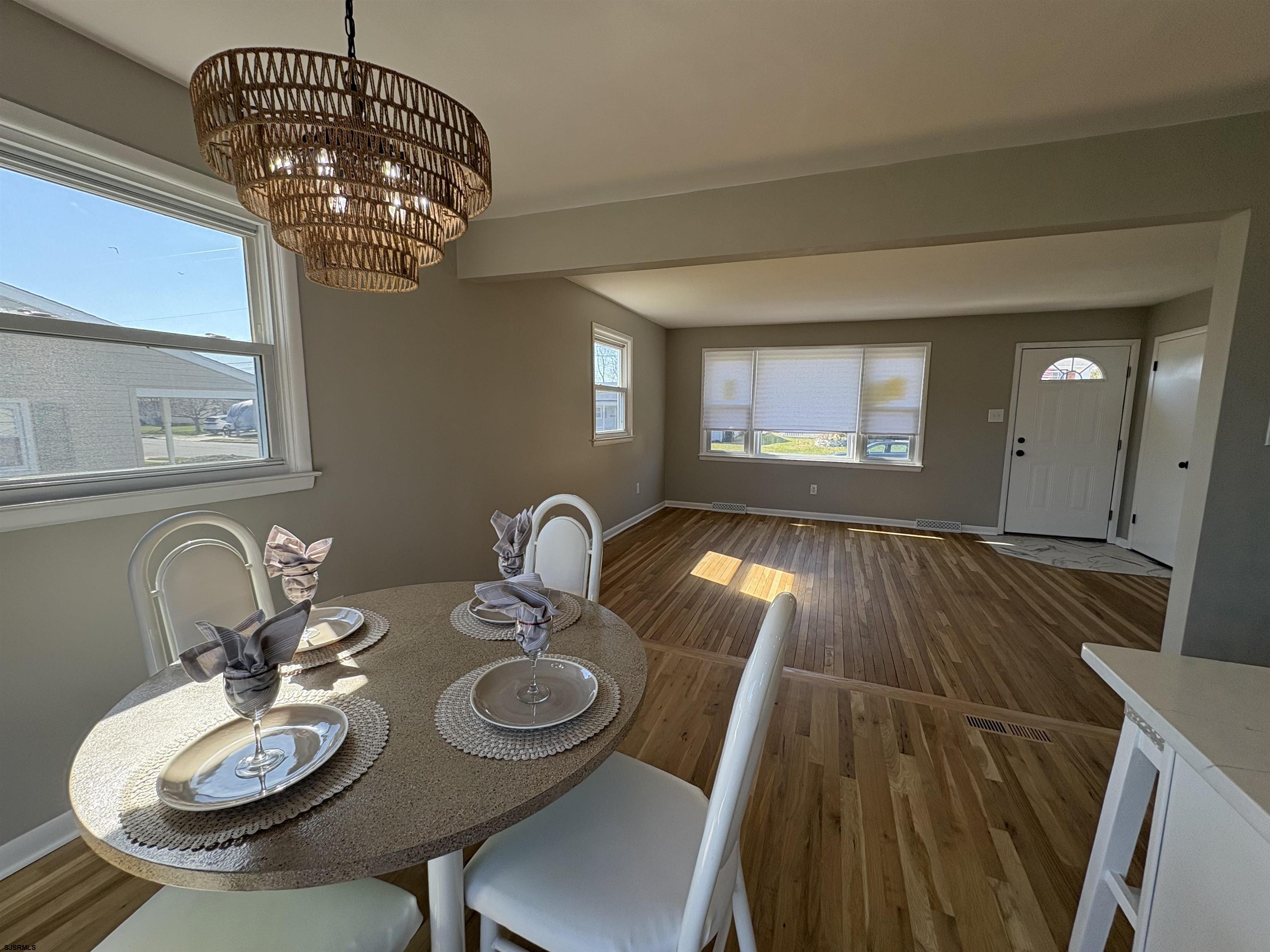 31 Gulph Mill Road Somers Point, NJ 08244 - Photo 4 of 32 a view of a dining room with furniture and chandelier