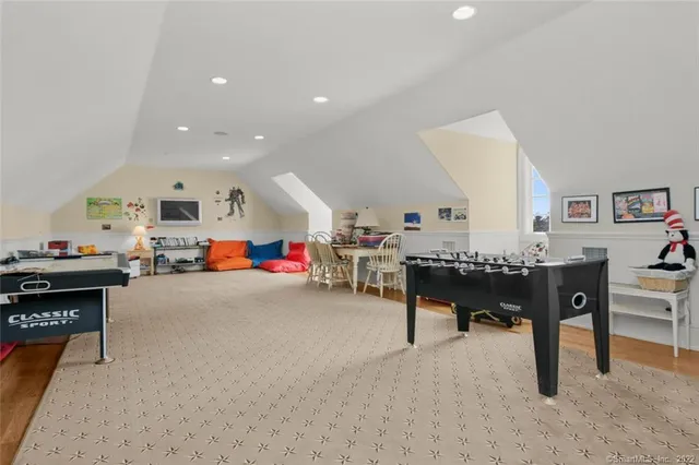 a room with furniture and a wooden floor