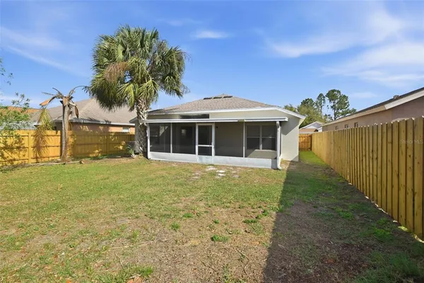 a front view of a house with a garden and porch