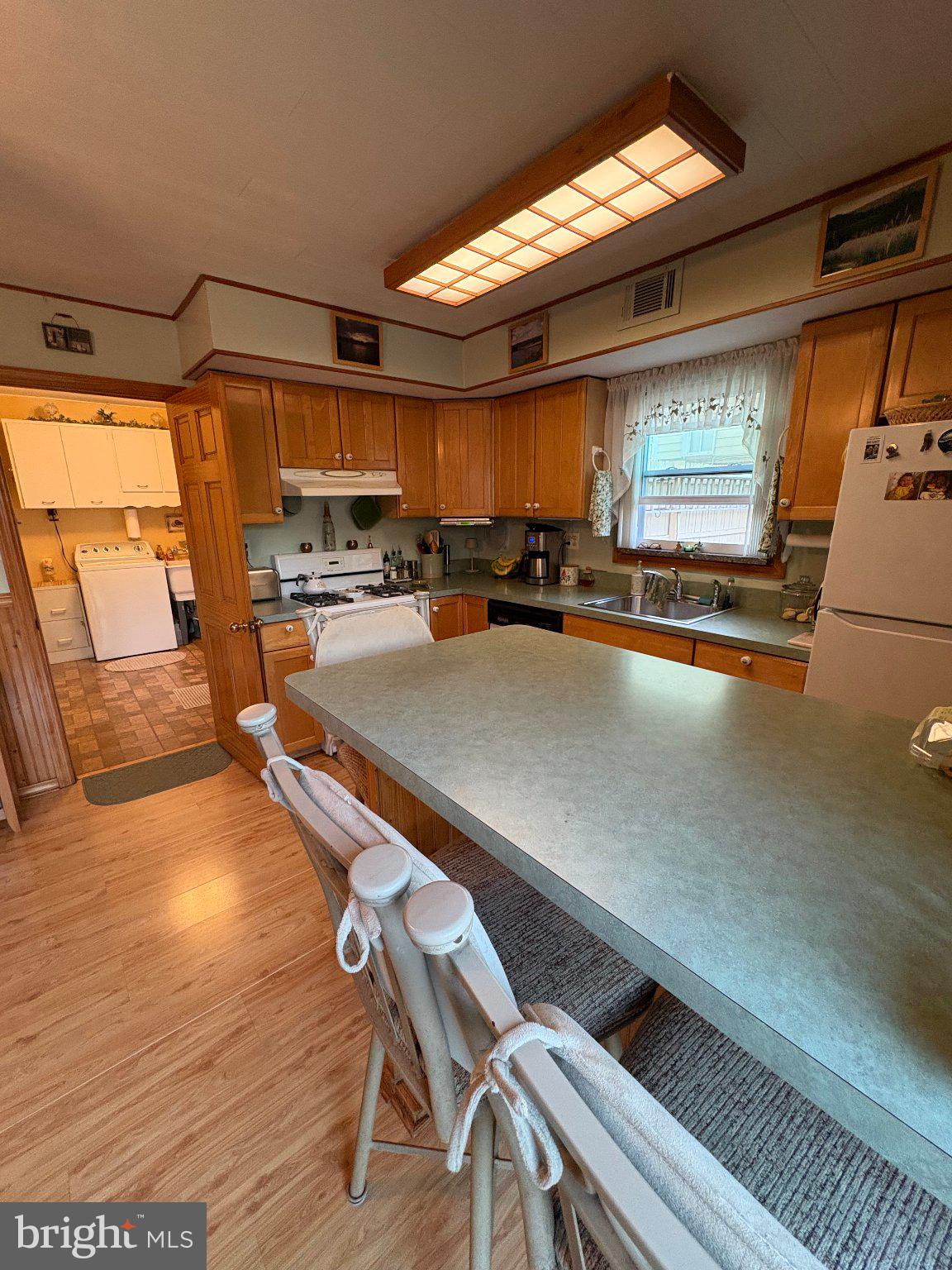 1045 Foster Street Philadelphia, PA 19116 - Photo 14 of 27 a view of a kitchen with dining table and chairs