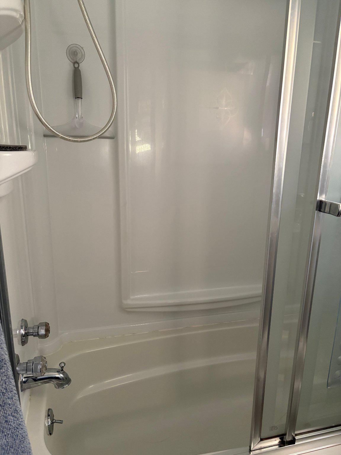 1045 Foster Street Philadelphia, PA 19116 - Photo 20 of 27 a bathroom with a sink and a mirror