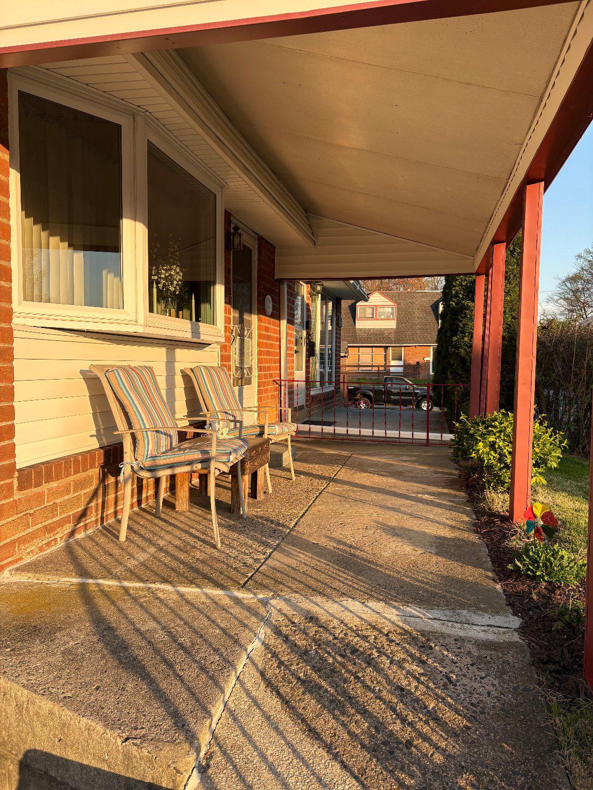 1045 Foster Street Philadelphia, PA 19116 - Photo 27 of 27 a view of a patio with table and chairs with wooden floor and fence