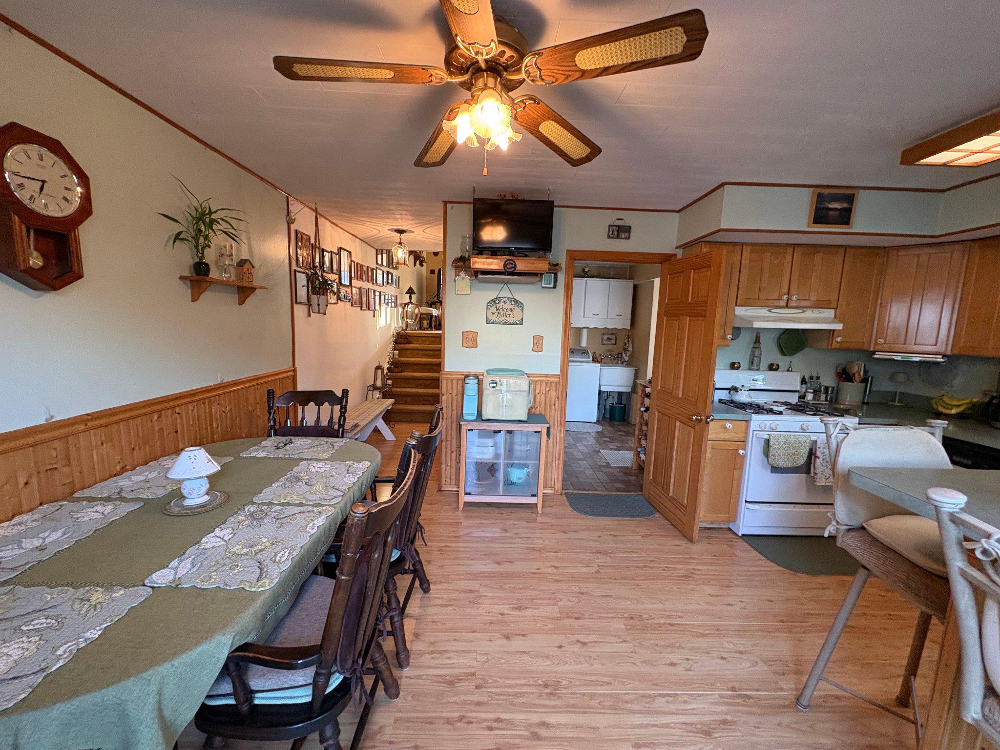 1045 Foster Street Philadelphia, PA 19116 - Photo 8 of 27 a dining room with furniture and wooden floor