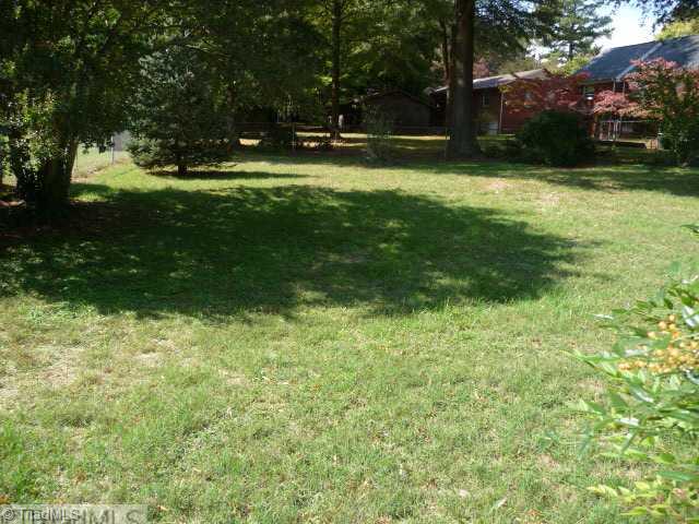1236 Pinebluff Road Winston-Salem, NC 27103 - Photo 2 of 12 Yard/Garden. Fenced backyard with patio area and room for a garden.