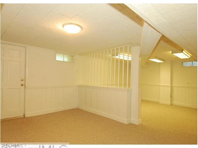 1236 Pinebluff Road Winston-Salem, NC 27103 - Photo 12 of 12 Playroom. Lower level finished area gives you lots of space in additon to the upper level.