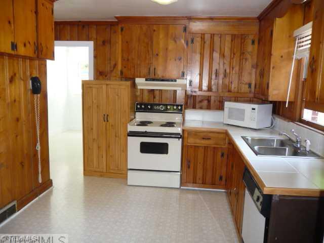 1236 Pinebluff Road Winston-Salem, NC 27103 - Photo 3 of 12 Kitchen. Kitchen with plenty of cabinet space, appliances and free standing pantry remains
