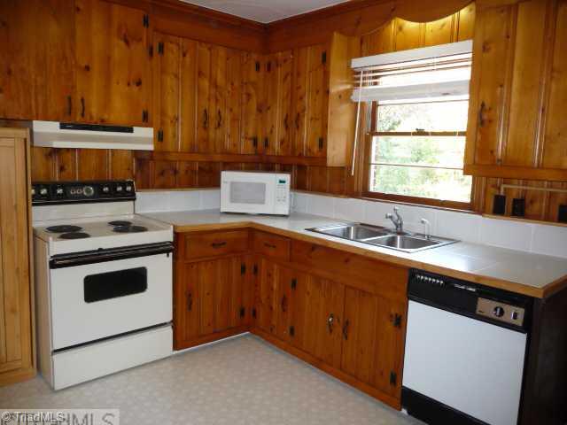1236 Pinebluff Road Winston-Salem, NC 27103 - Photo 4 of 12 Kitchen. New counter tops in the kitchen.