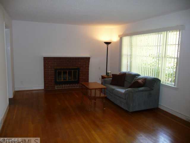 1236 Pinebluff Road Winston-Salem, NC 27103 - Photo 6 of 12 Living Room. Spacious living room w/ beautiful Hardwood Floors and freshly painted interior