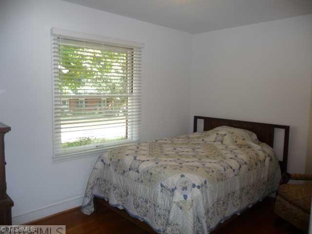 1236 Pinebluff Road Winston-Salem, NC 27103 - Photo 8 of 12 Master Bedroom. Master Bedroom with neutral decor and 2" blinds
